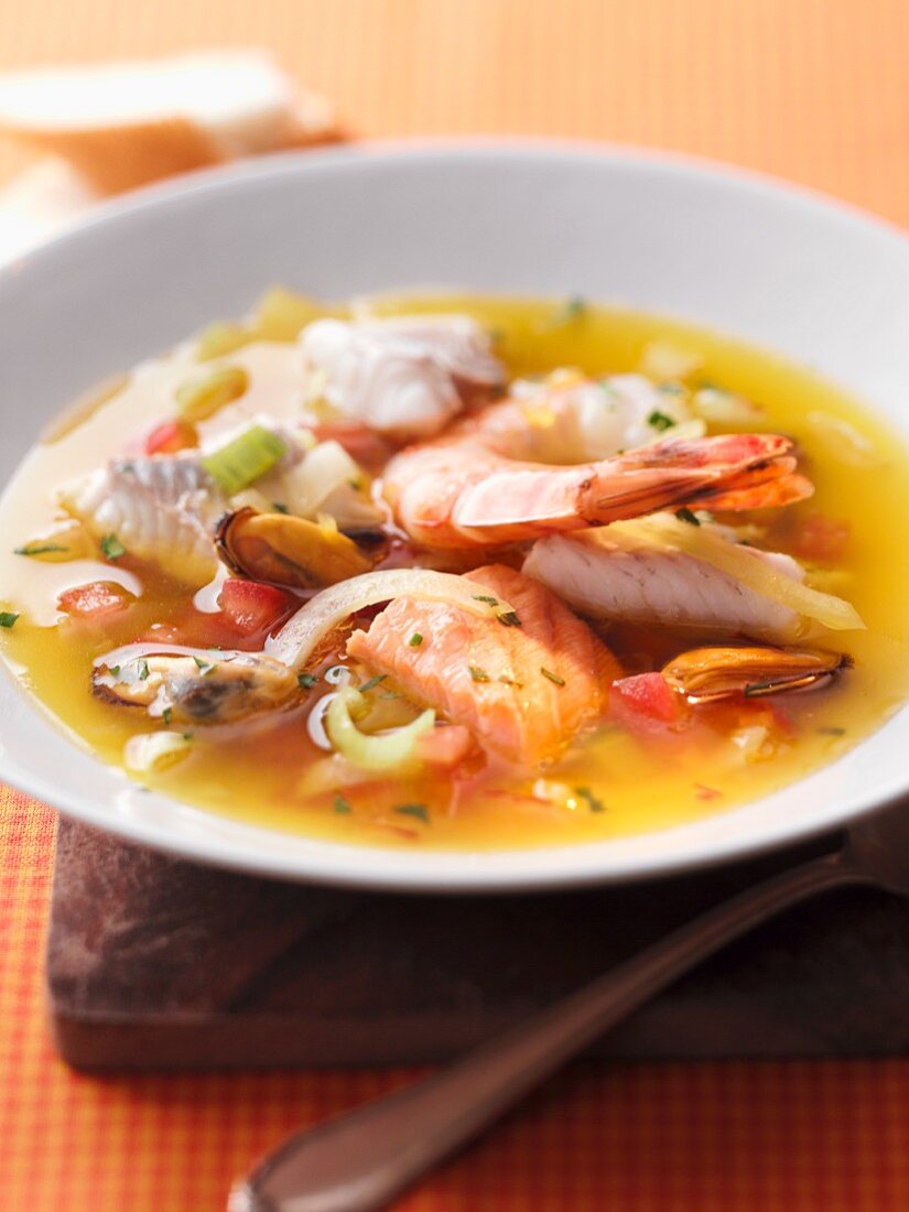 Zuppa di mare (fish stew with mussels and prawns, Italy)