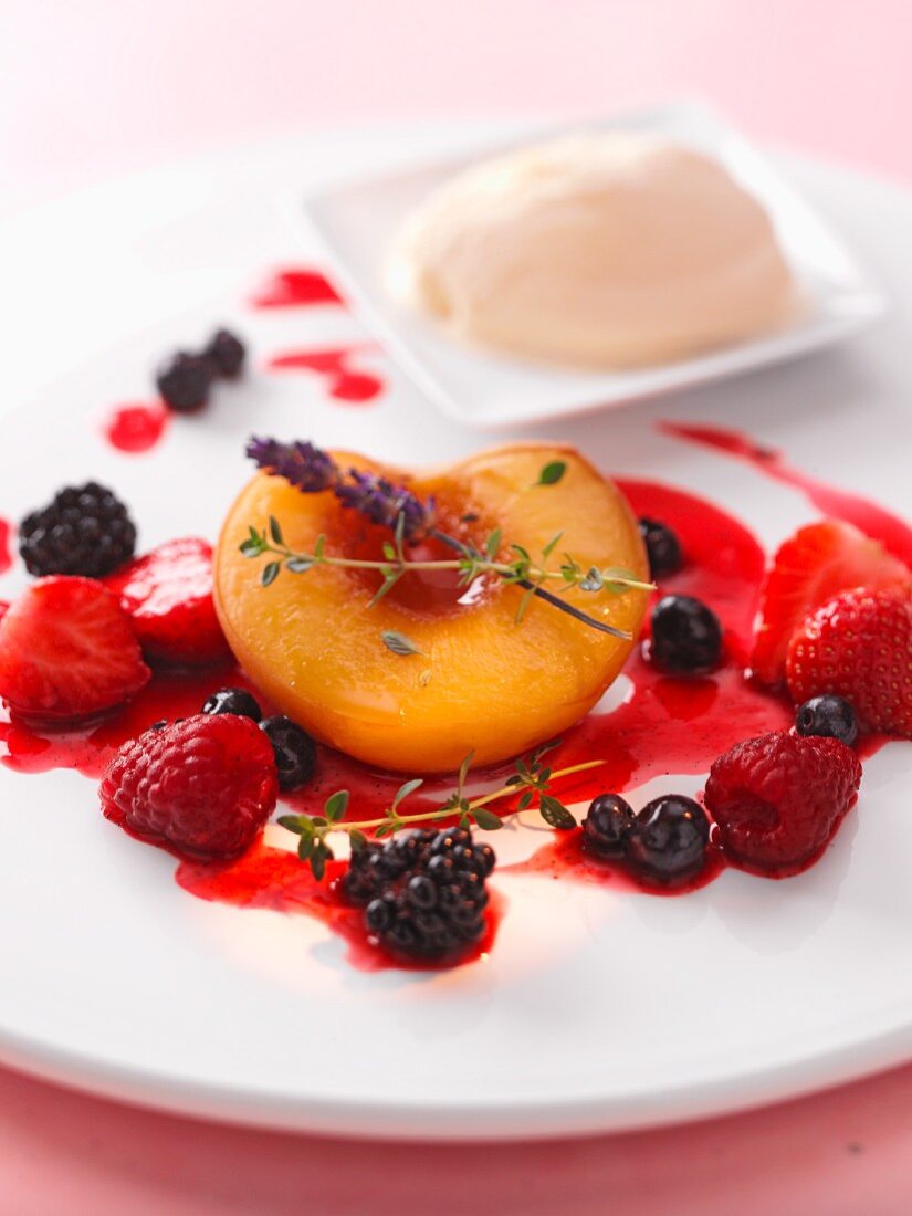 Summer fruits with berry sauce, lavender and vanilla ice cream