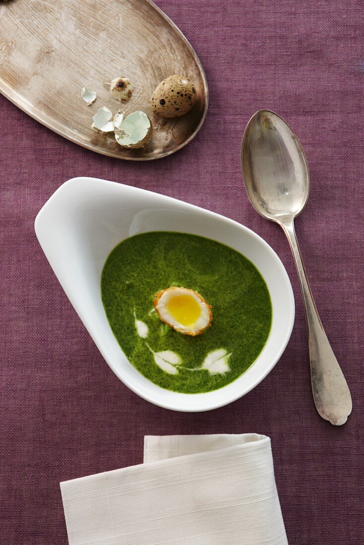 Watercress soup with fried quail's eggs