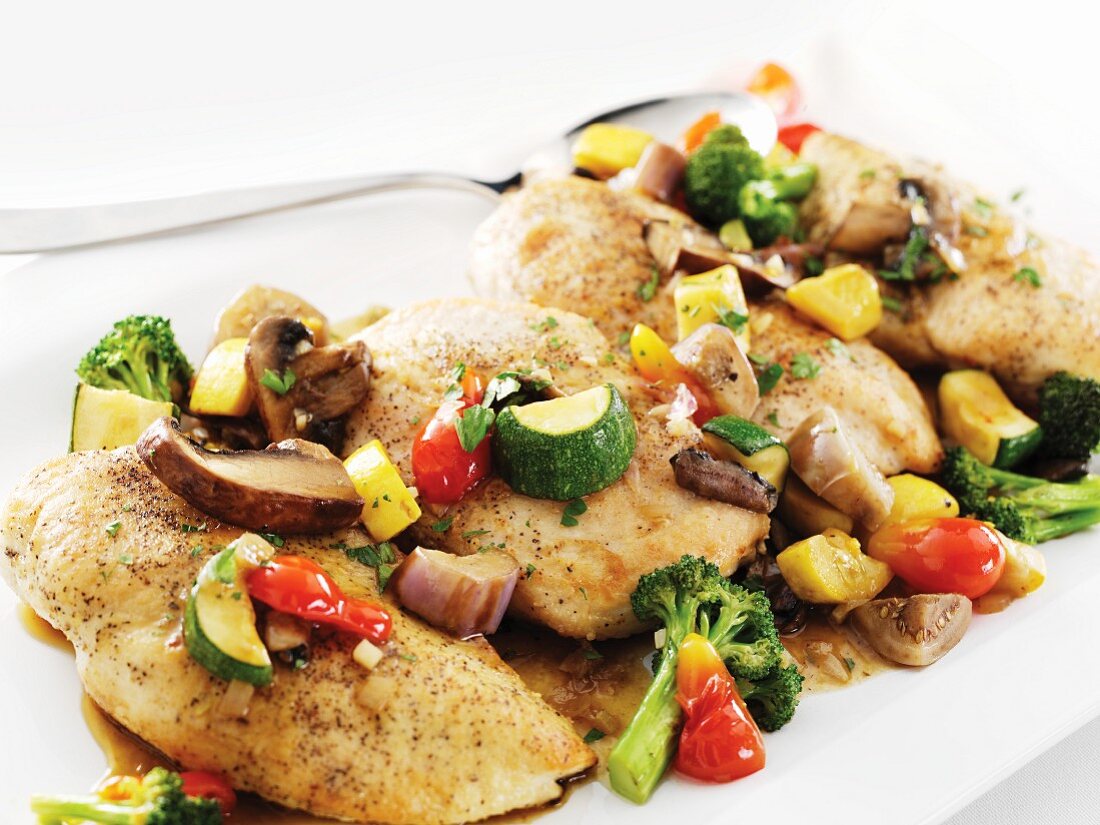 Sauteed Chicken Breasts with Mixed Vegetables in a White Wine Sauce