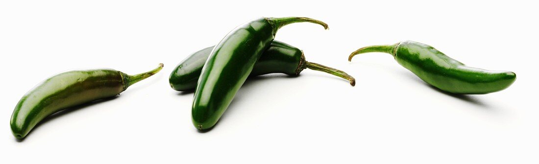 Fresh Whole Jalapeno Peppers on a White Background