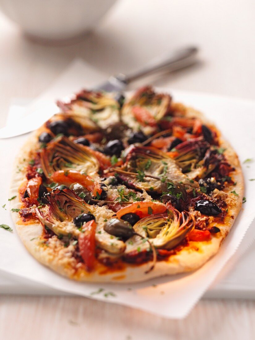 Artichoke, olive and caper pizza