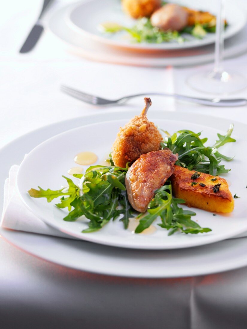 Quail with rocket and polenta slices