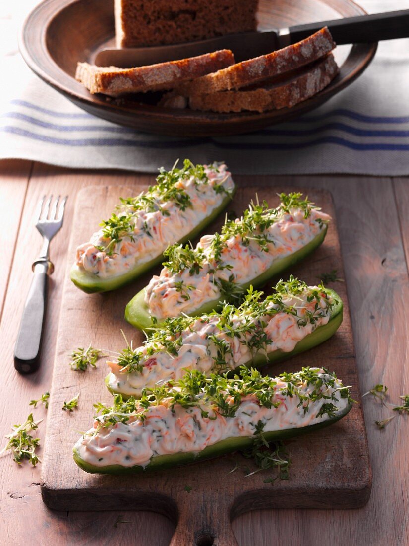 Cucumber boats filled with prawns and cress