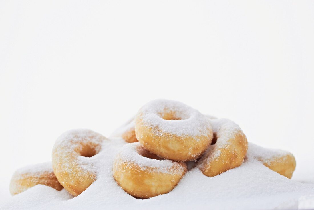 Doughnuts in a pile of sugar