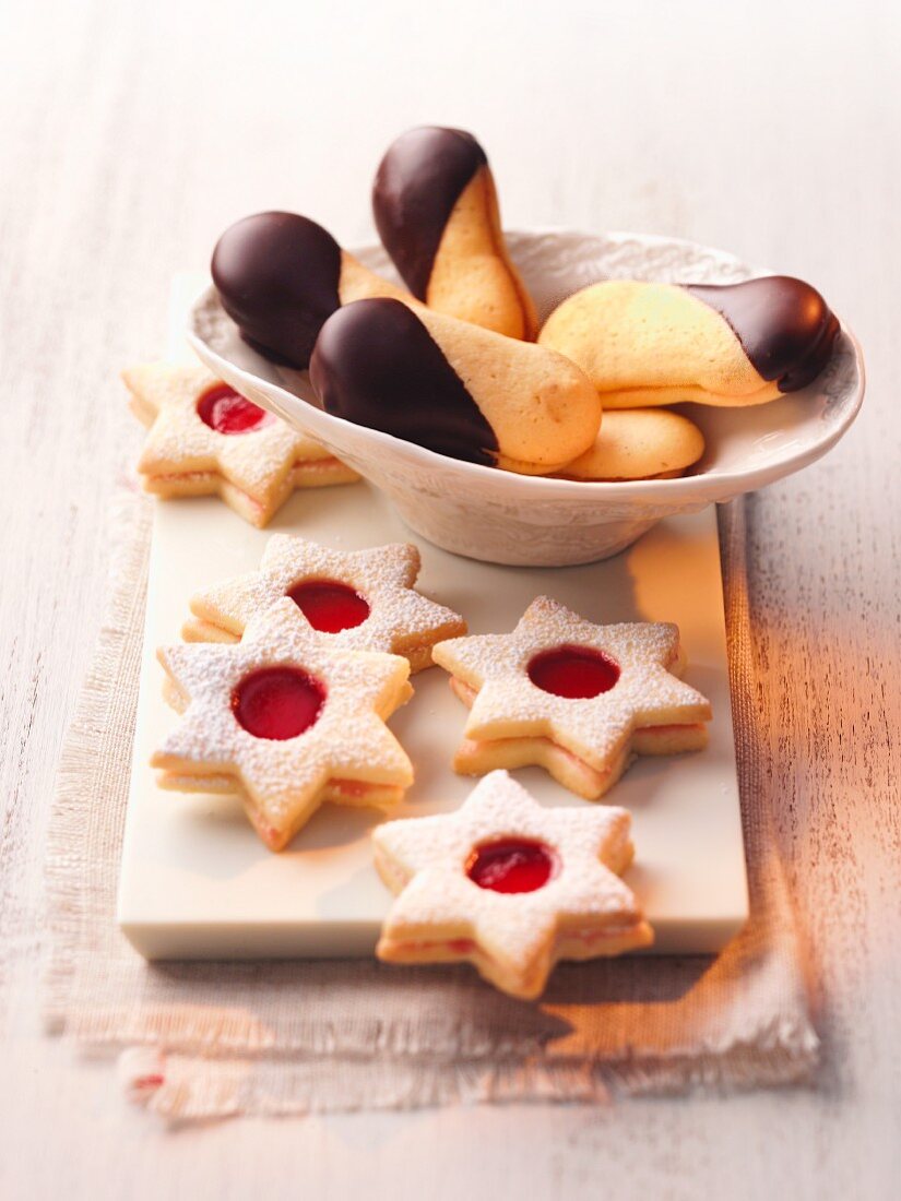 Shortbread biscuits with chocolate glaze and jam biscuits