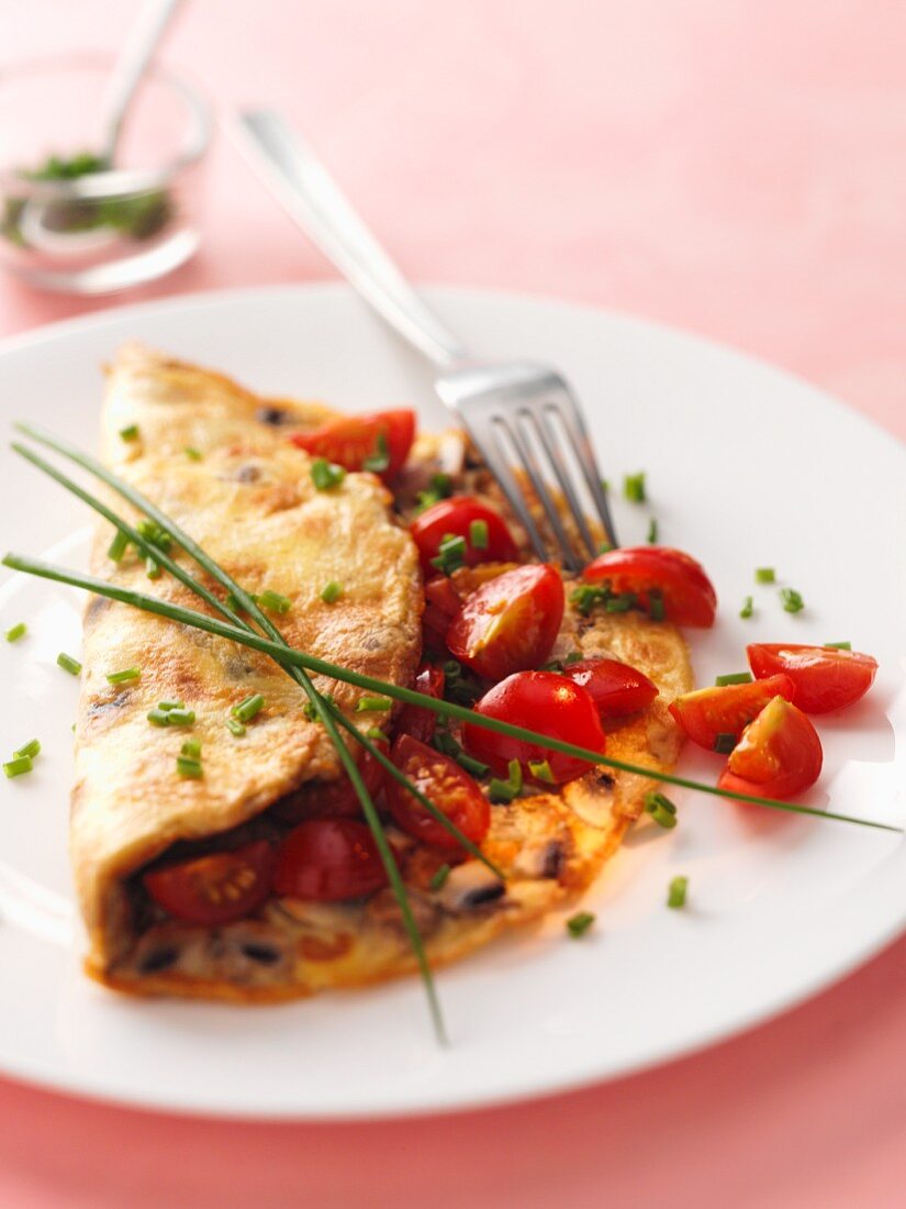 Mushroom omelette with cherry tomatoes