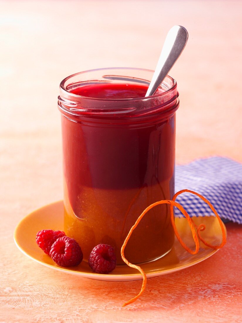 Raspberry jam and marmalade in the same jar