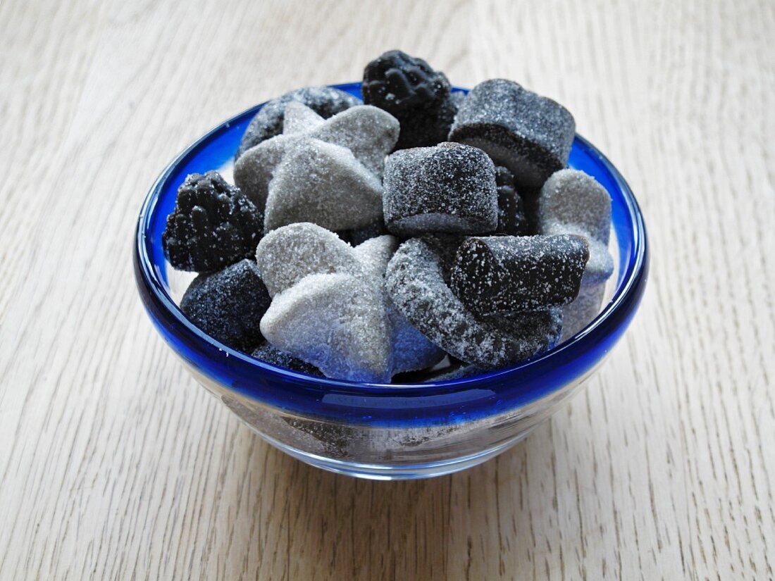 Liquorice sweets in a glass bowl