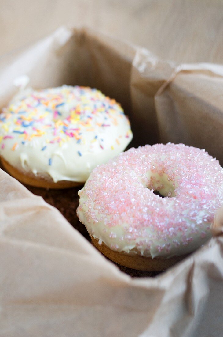 Doughnuts with white chocolate and sugar