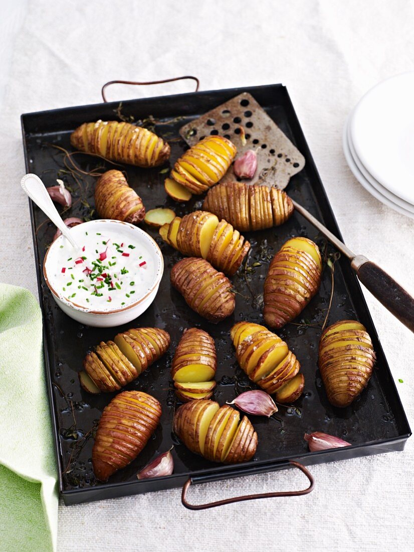 Hasselback potatoes with chive quark