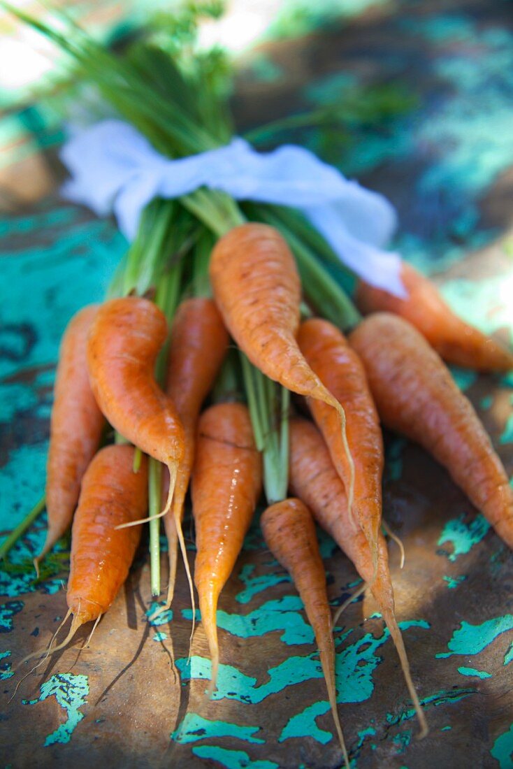Whole Peeled Carrots Bundled with an Elastic Band