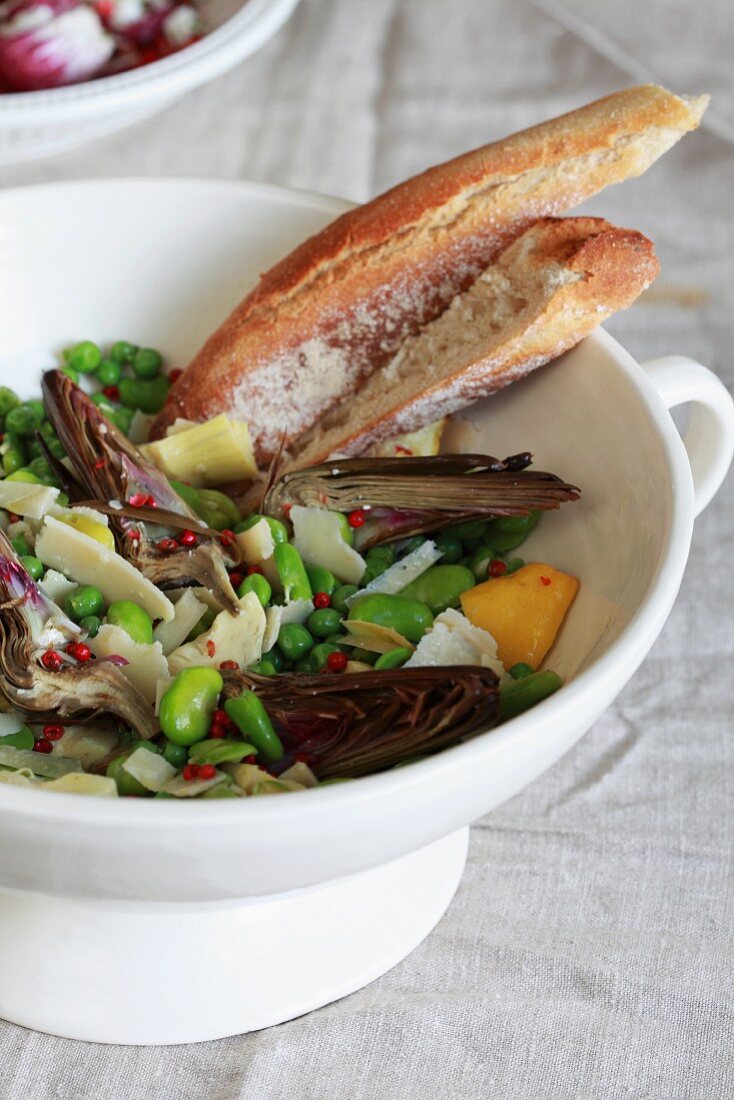 Artichoke salad with broad beans, peas and parmesan shavings