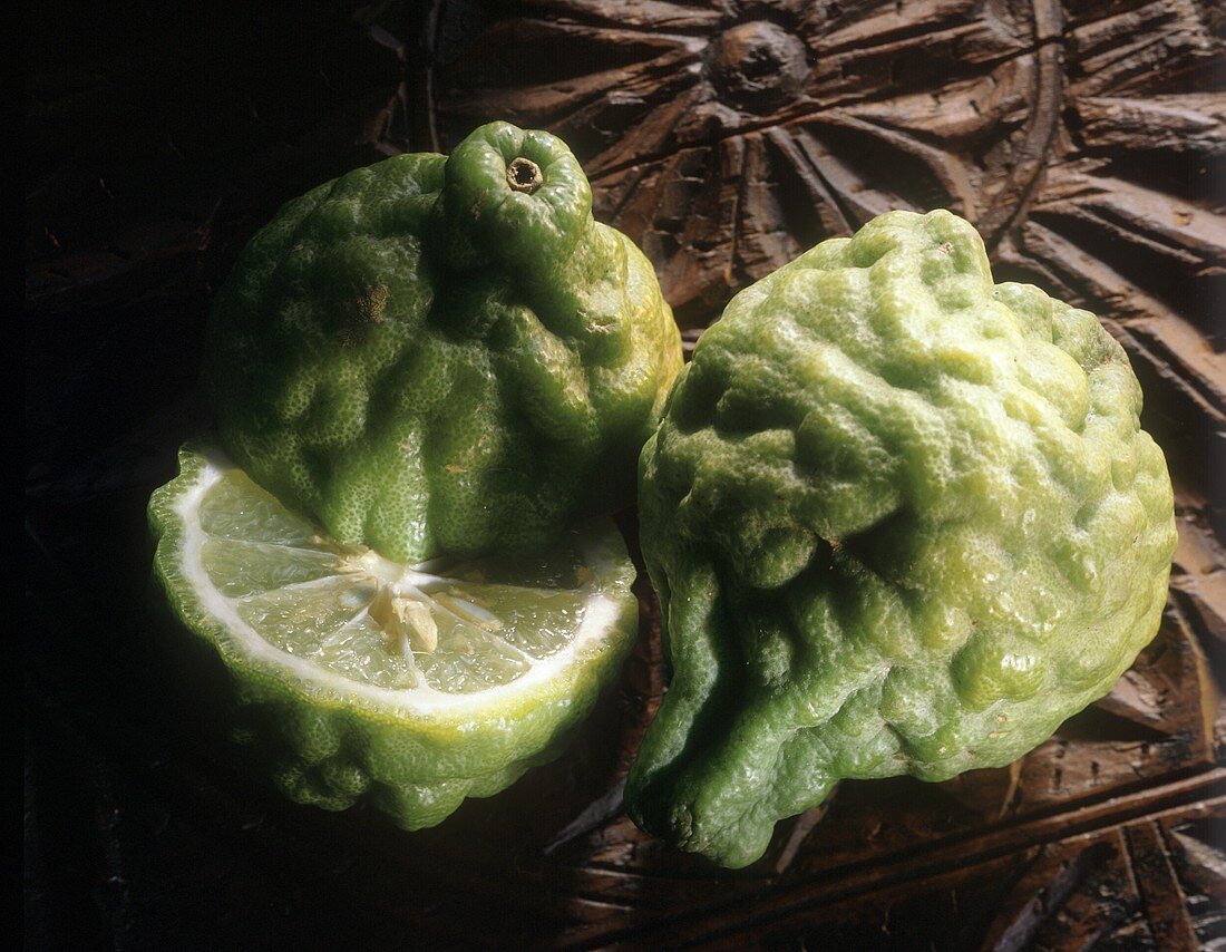 Whole and Half of a Kaffir Lime