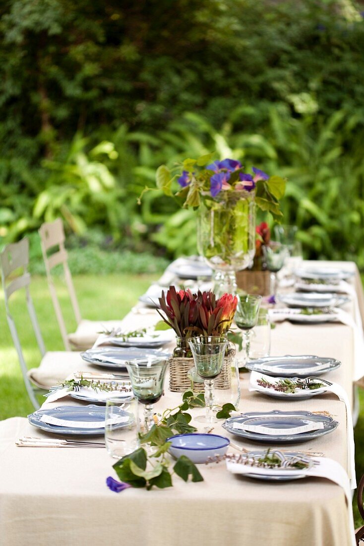 A table laid for a meal in the garden