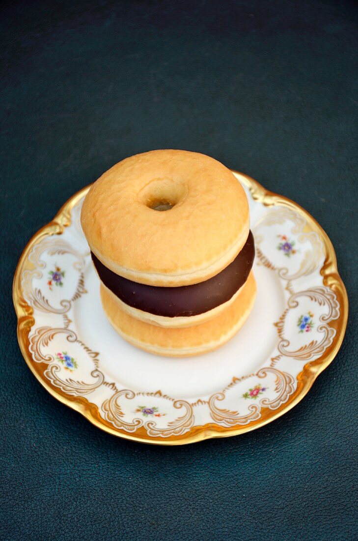 Three doughnuts on a plate
