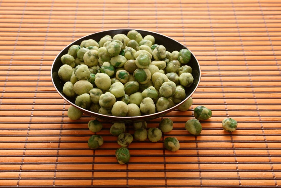 A bowl of wasabi peas
