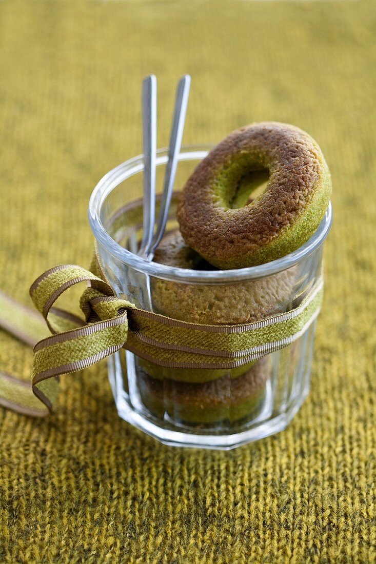 Doughnuts with green tea in a glass