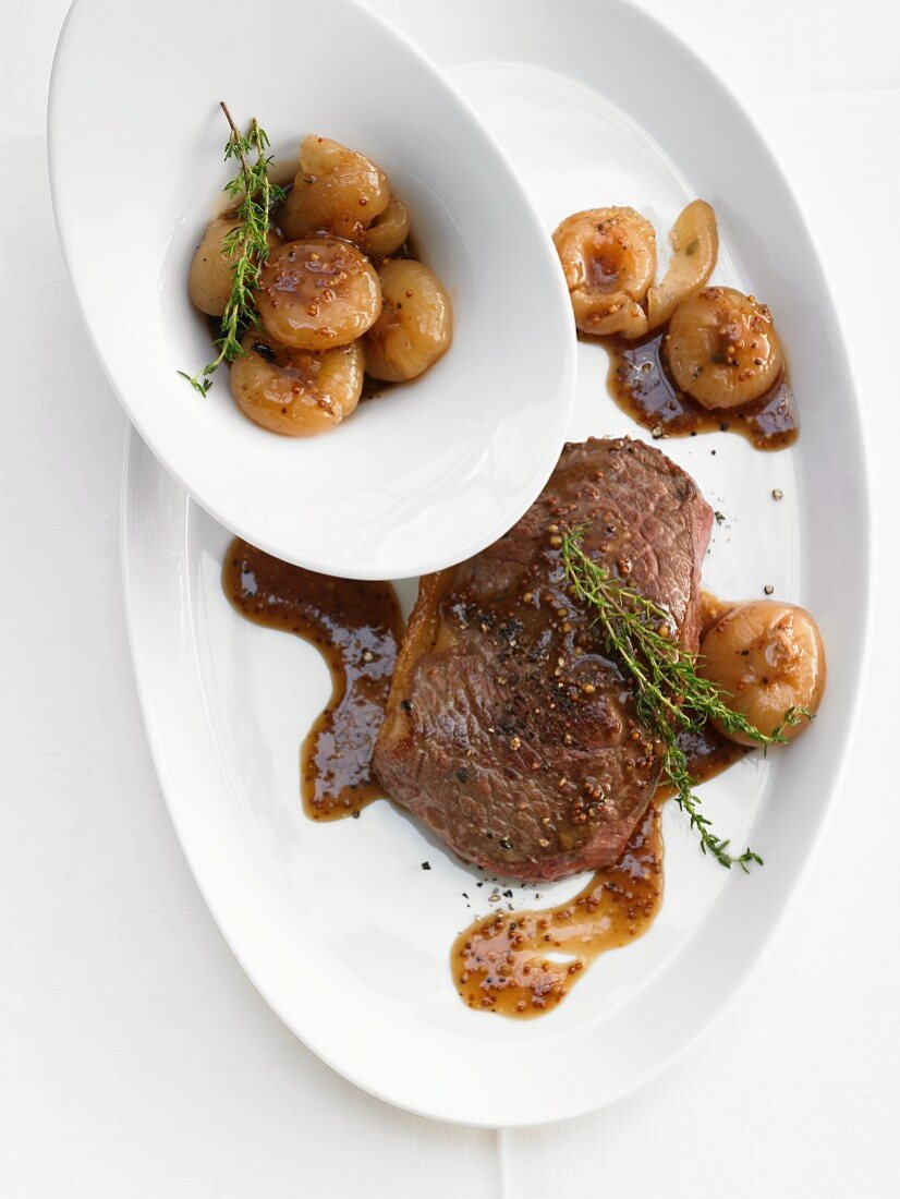 Beef steak with onions and gravy