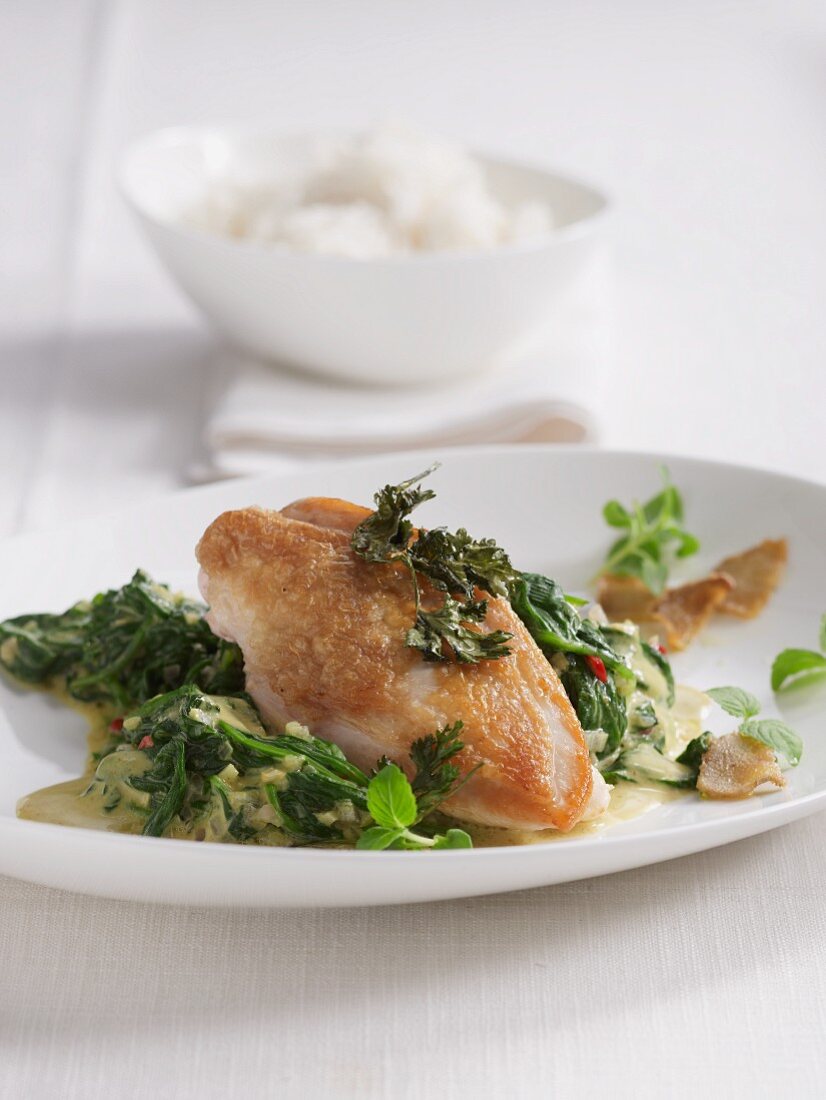 Chicken breast with ginger and coconut and curry spinach