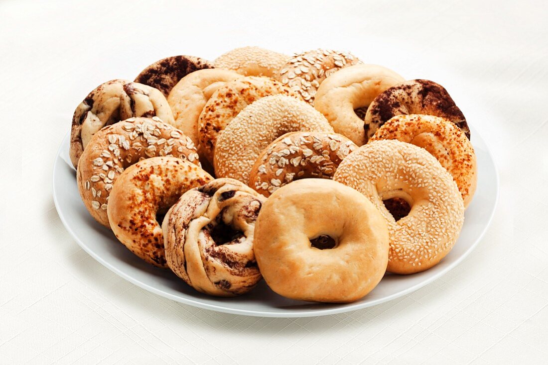 Variety of Bagels on a Platter; White Background