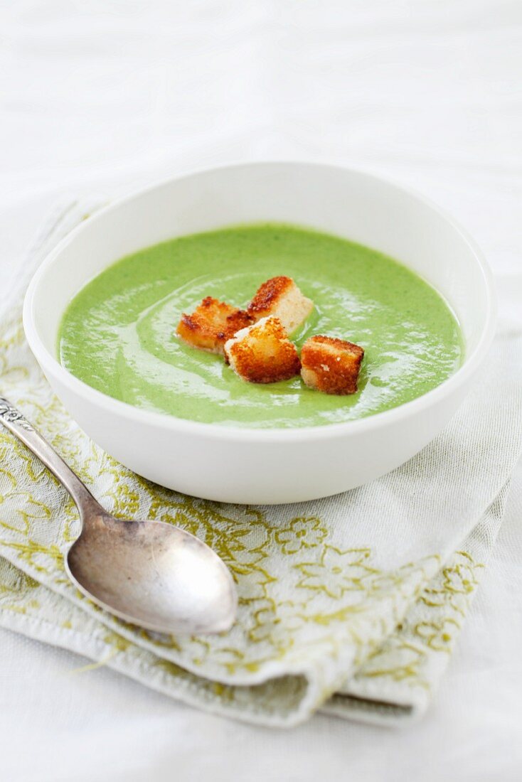 Bowl of Broccoli Cheddar Soup with Croutons