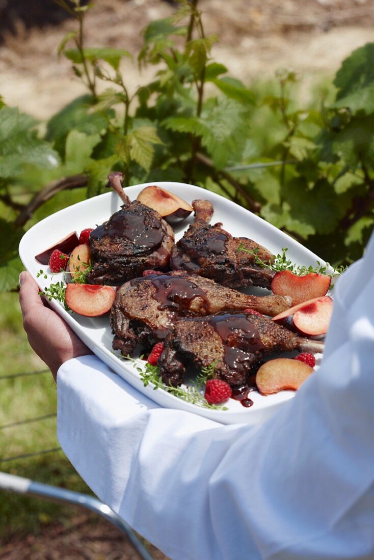 Braised duck leg with plums