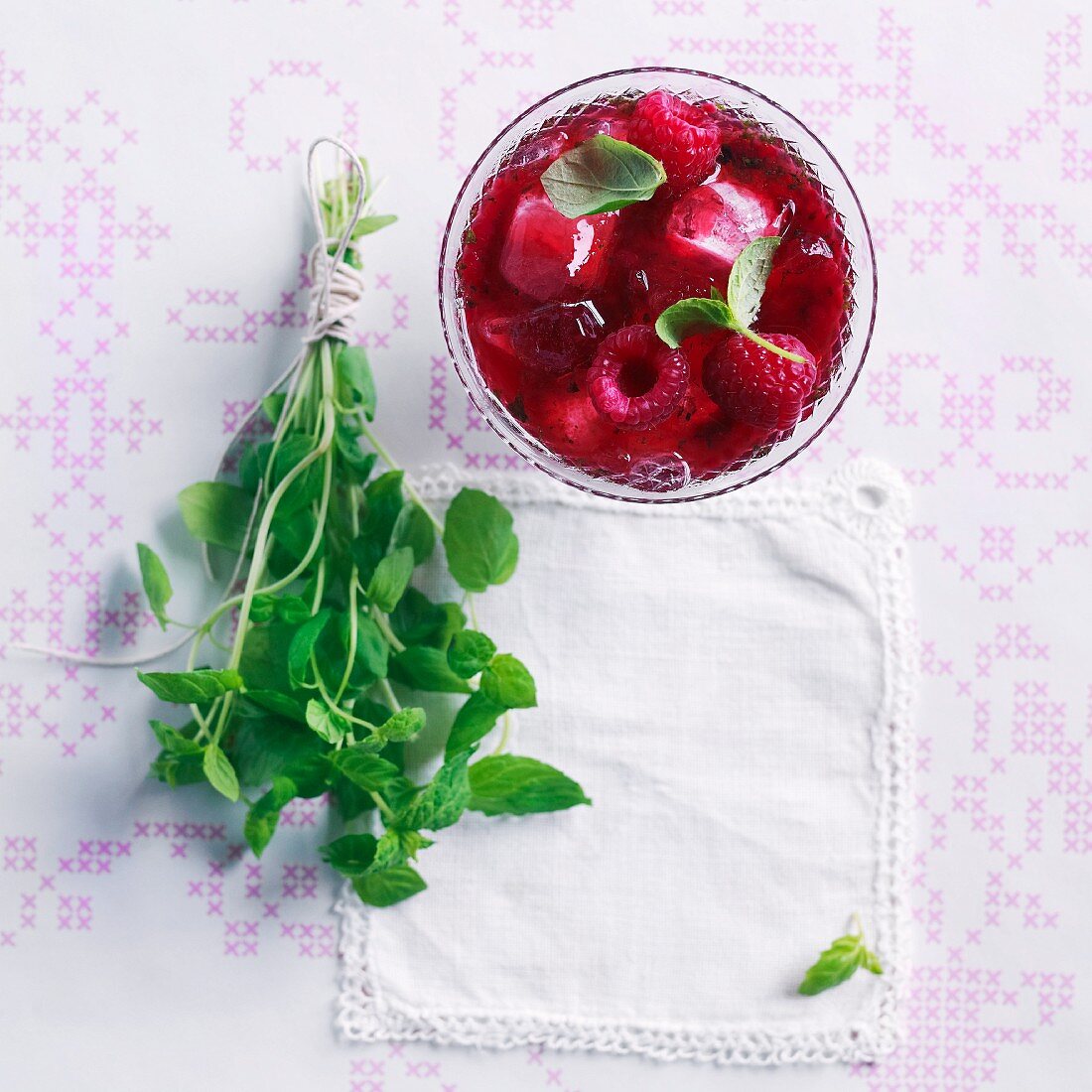 A raspberry mojito with mint