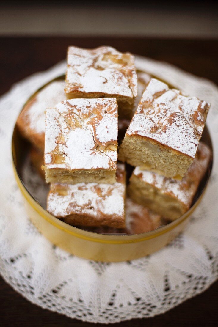 Apple slices in a cake tin