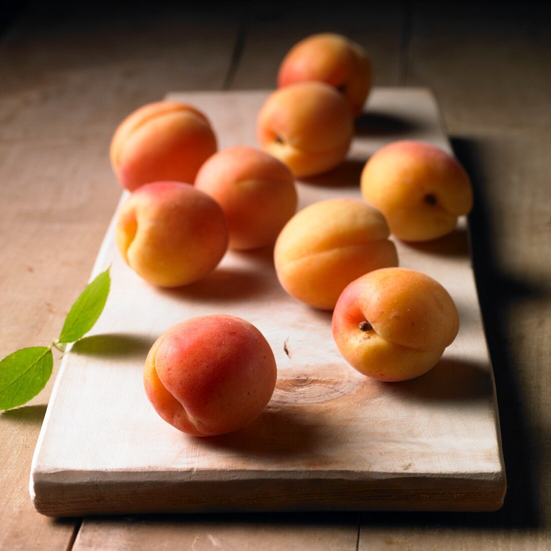 Apricots on a wooden board