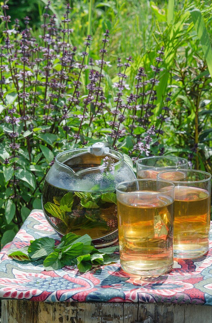 Mint tea in a teapot and glasses