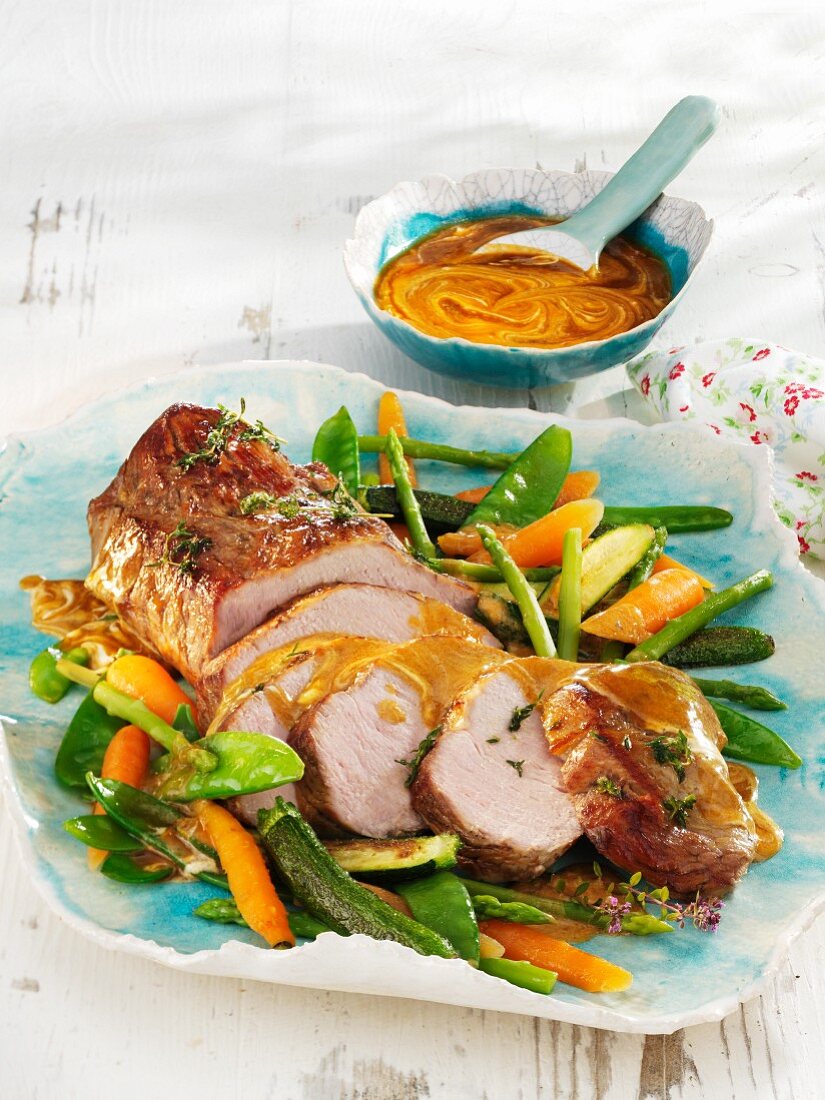 Marinated roasted veal with spring vegetables