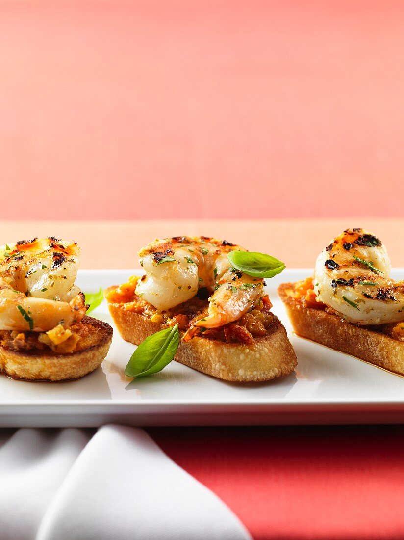 Bruschetta topped with grilled shrimps