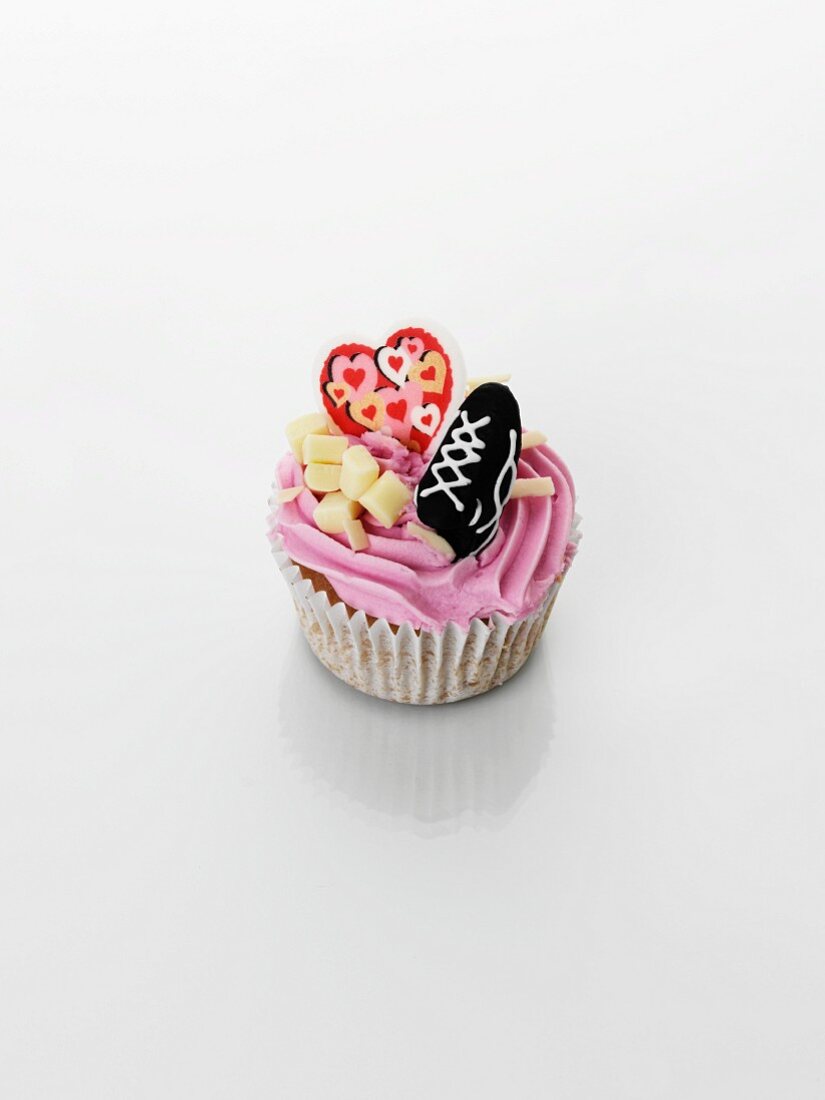 A cupcake with strawberry cream for Valentine's Day