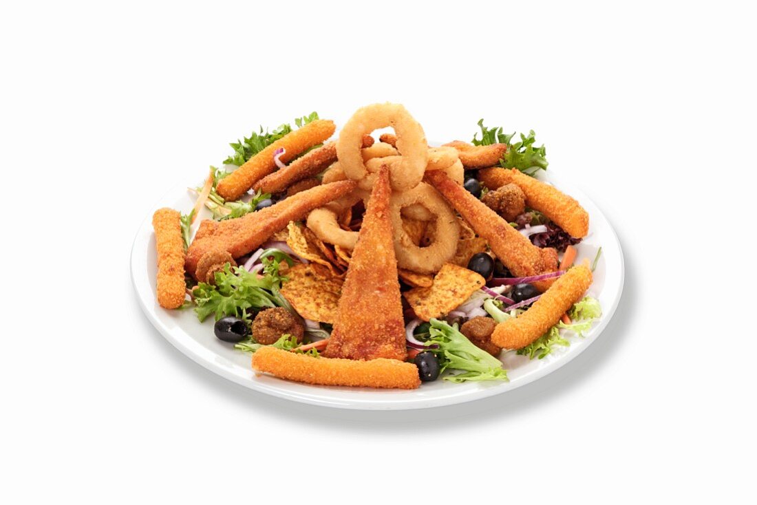 A platter of crispy fried onion rings, mozzarella sticks, mushrooms and nachos