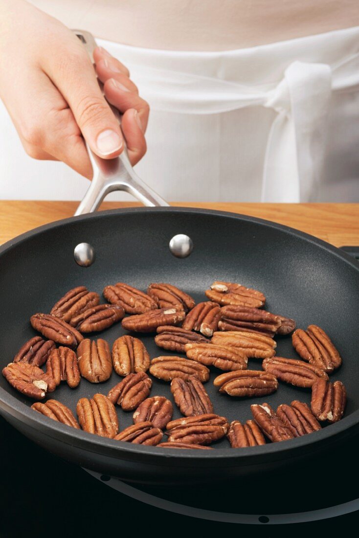 Pecan nuts being toasted