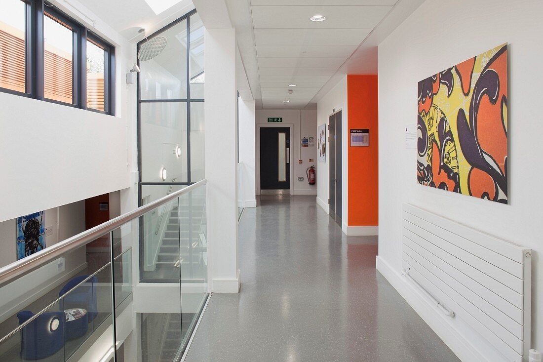 Modern hallway in a college with skylight and glass stairwell (Oxford and Cherwell Valley College)