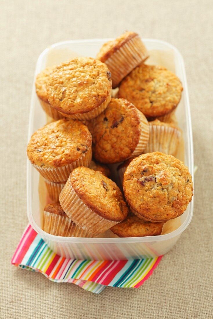 Oat muffins in a plastic container