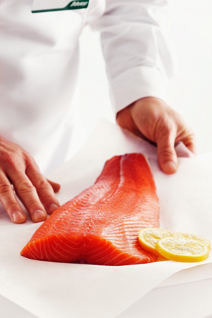 A side of salmon with lemon slices