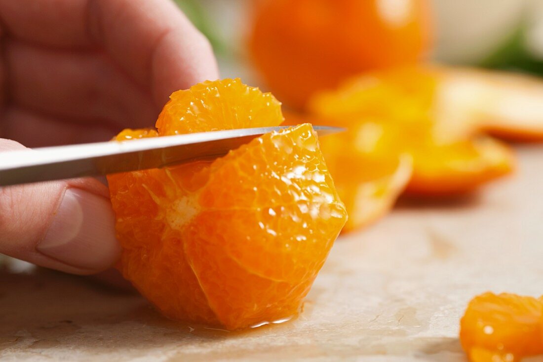 A mandarin being filleted (close-up)