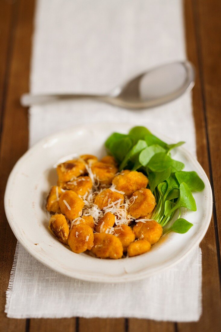 Pumpkin gnocchi with Parmesan and purslane