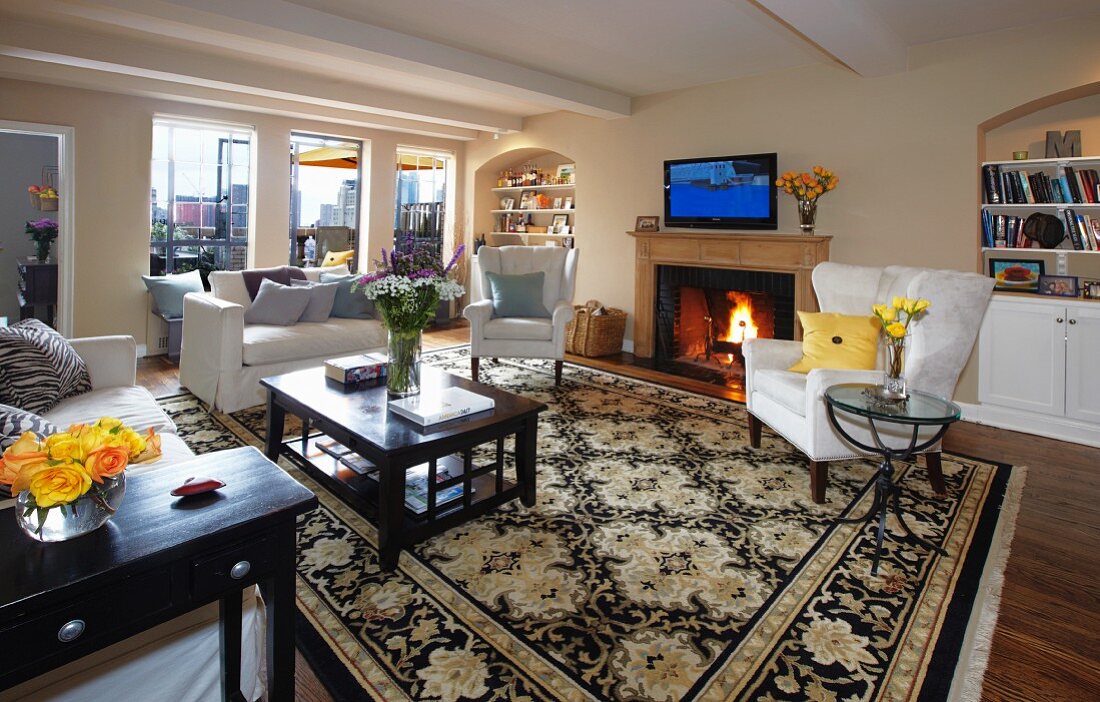 Large Living Room with Fire Burning in the Fire Place