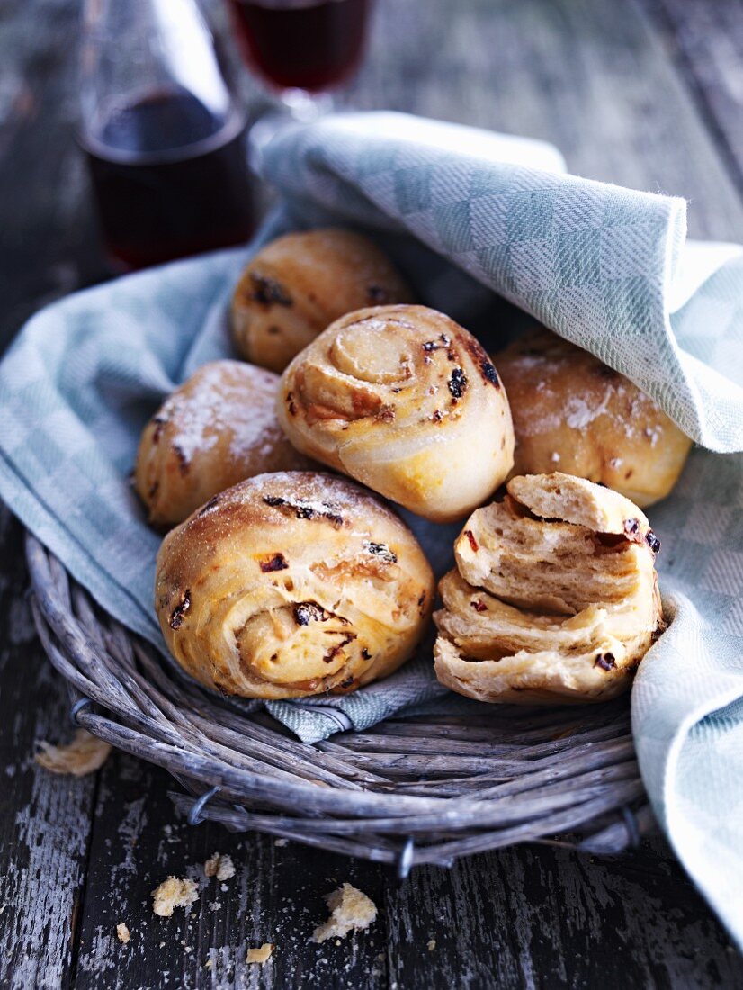 Tomato bread rolls in a bread basket