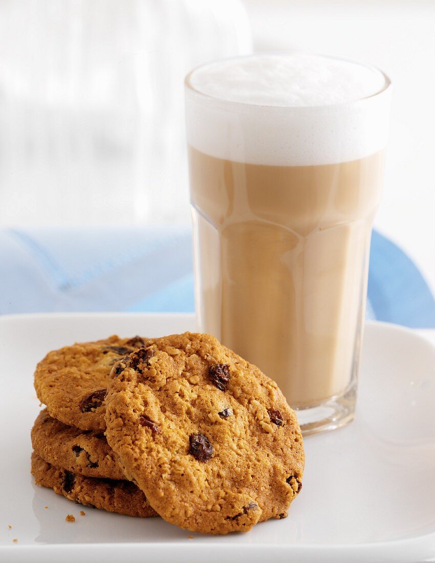 Chocolate chip cookies and a caffe latte