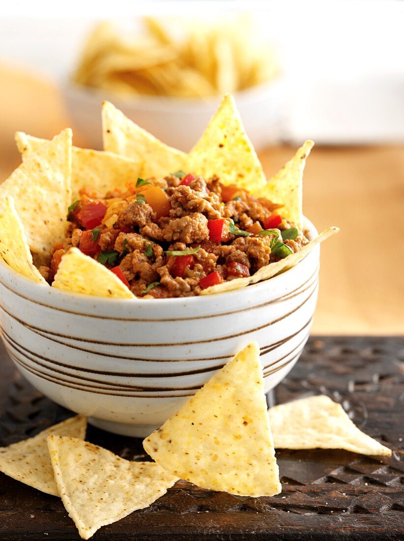 Tortilla chips with a minced meat sauce