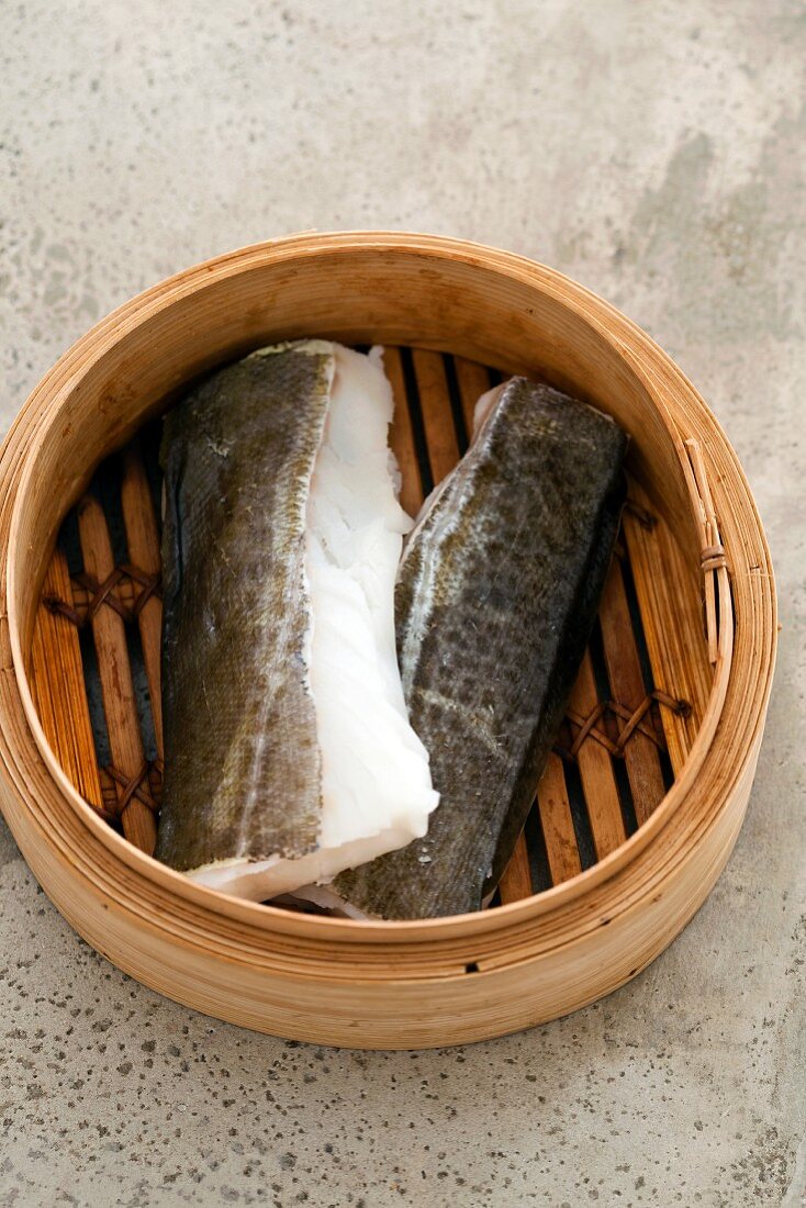 Cod fillets in a bamboo steamer