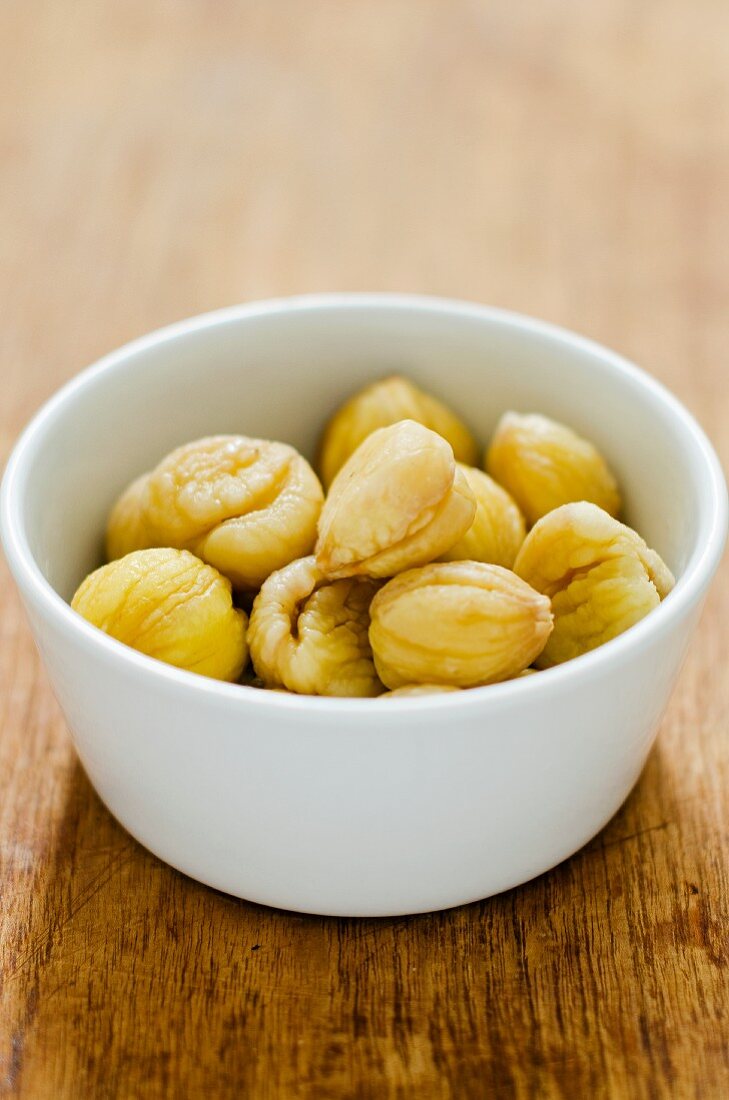 A bowl of peeled chestnuts