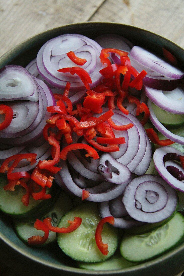 Onion rings, cucumber slices and chillis