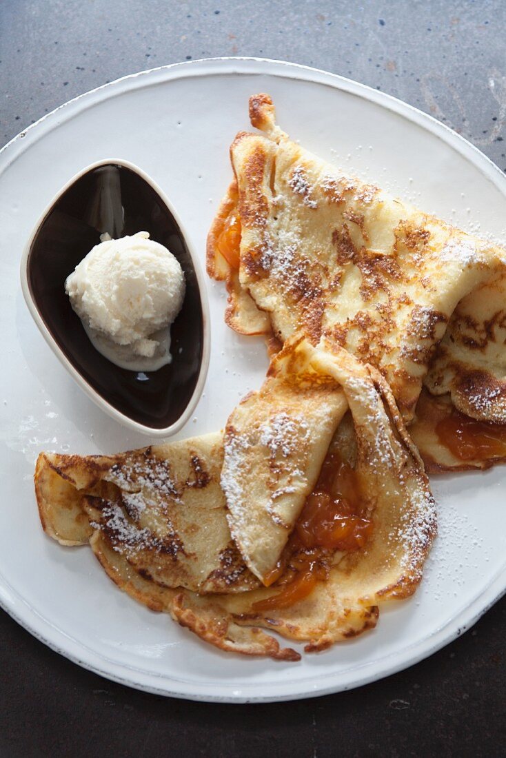 Crepes with jam and vanilla ice cream