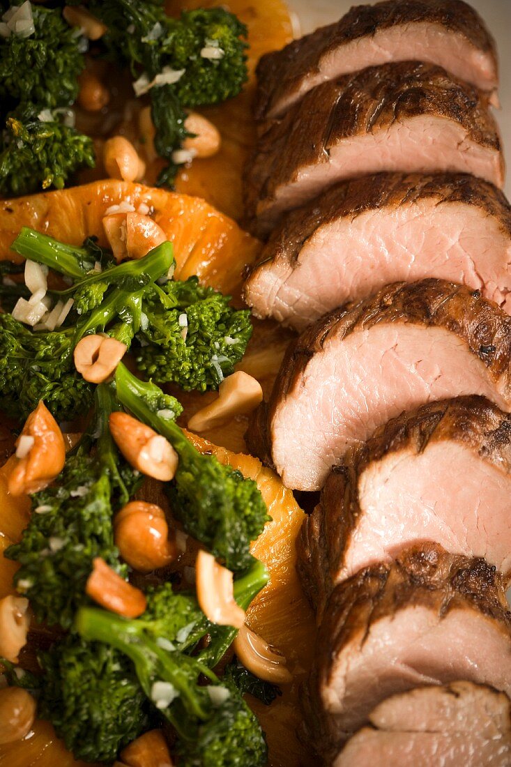 Sliced Pork with Broccoli Rabe and Nuts